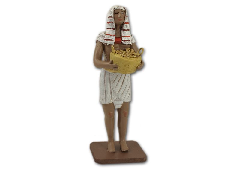 Egipcio con cesto de semillas
