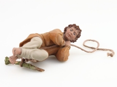 Niño columpiándose 20 cm.