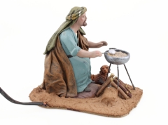 Pastor haciendo gachas 17 cm. (con luz y movimiento)