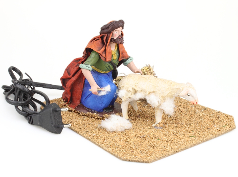Pastor esquilando una oveja 14 cm. (movimiento)
